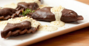 Some different ravioli - chocolate ravioli with cream cheese and aromatic pear sauce